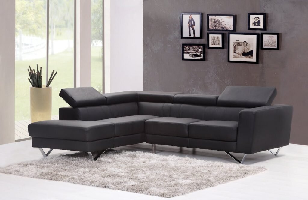 Black Fabric Sectional Sofa Near Glass Window